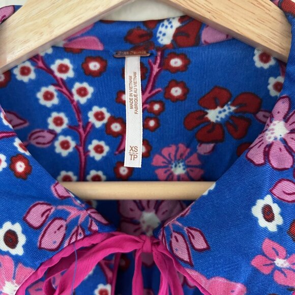 Free People Daisy Jane Mini Dress Purple Floral Retro Tie Neck SXS Boho LS - Picture 8 of 9